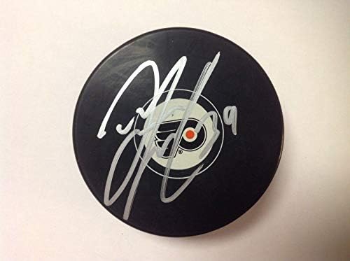 Тайрелл Гоулборн подписа хокей шайба Филаделфия Флайърс с автограф a - за Миене на НХЛ с автограф